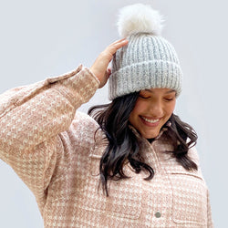 The Ky Double Pom Pom Beanie Hat in Grey